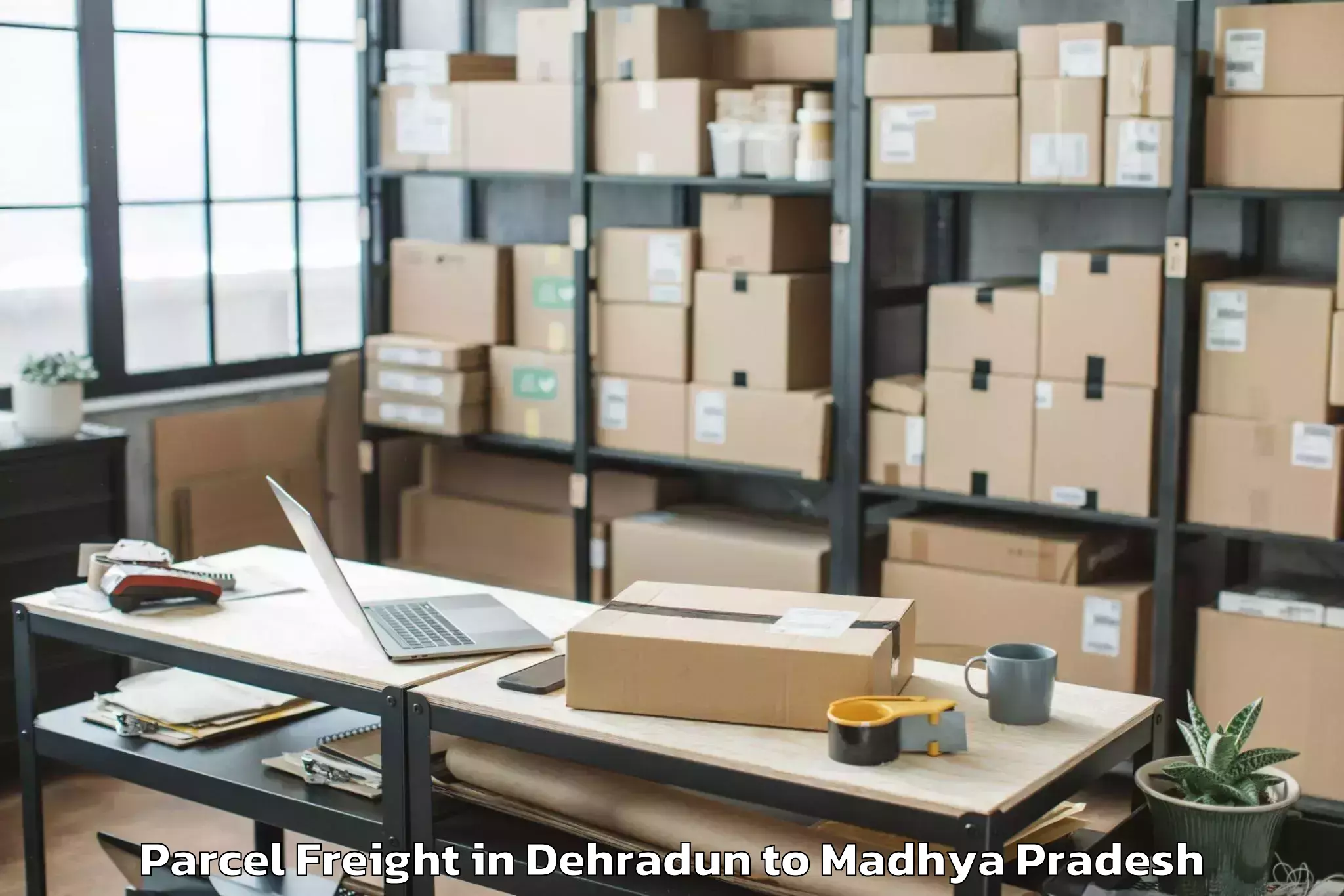 Easy Dehradun to Sardarpur Parcel Freight Booking